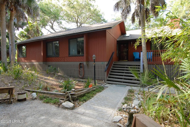 view of front of home featuring a shingled roof