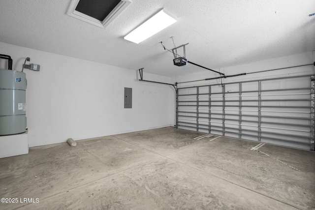 garage with a garage door opener and electric panel