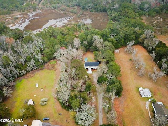 aerial view featuring a forest view