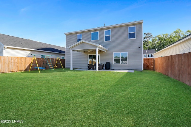 32 Chinquapin St, Beaufort, SC 29906 - back of property with a ceiling fan, a patio area, a fenced backyard, and a lawn