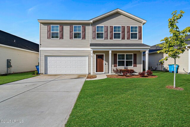 32 Chinquapin St, Beaufort, SC 29906 - traditional-style house featuring a garage, a porch, a front yard, and concrete driveway