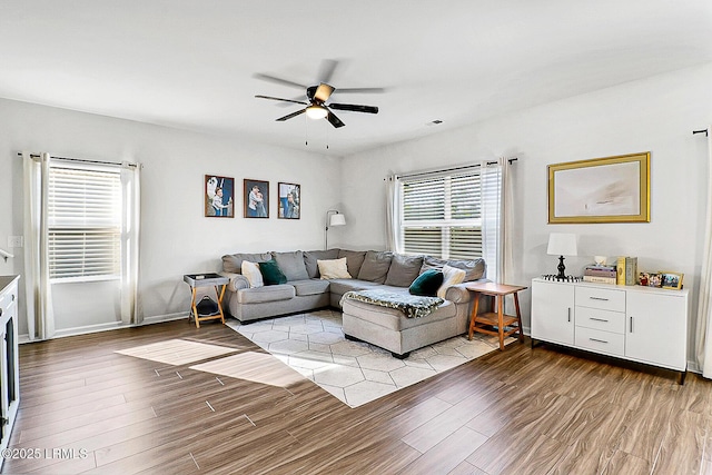 32 Chinquapin St, Beaufort, SC 29906 - living room with wood finished floors, baseboards, and ceiling fan