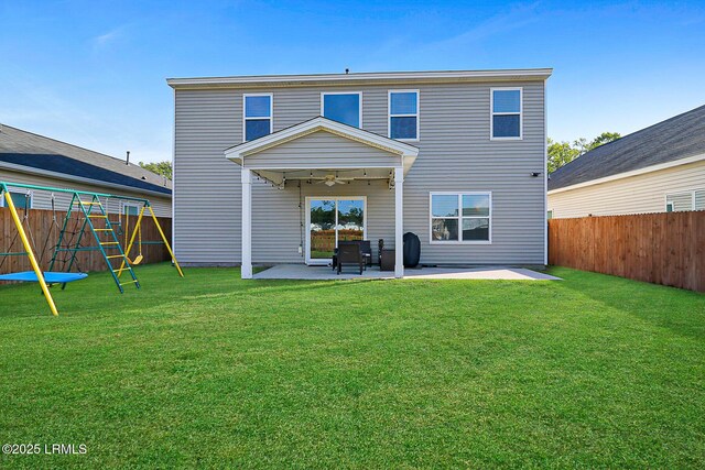 32 Chinquapin St, Beaufort, SC 29906 - rear view of house featuring a yard, a fenced backyard, a patio, and ceiling fan