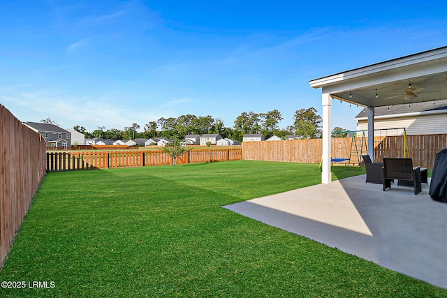 32 Chinquapin St, Beaufort, SC 29906 - view of yard featuring a residential view, a ceiling fan, a patio area, and a fenced backyard