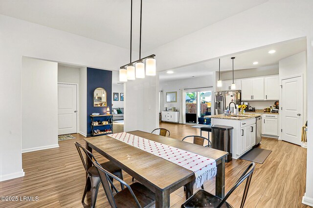 32 Chinquapin St, Beaufort, SC 29906 - dining space featuring recessed lighting, light wood-style flooring, and baseboards