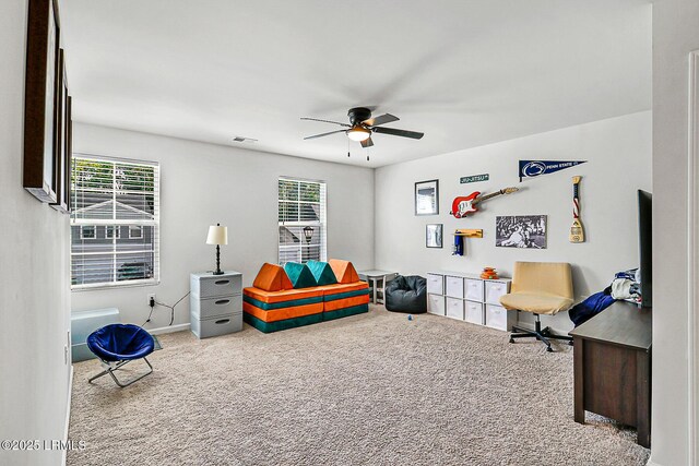 32 Chinquapin St, Beaufort, SC 29906 - living area featuring ceiling fan, carpet floors, and a wealth of natural light