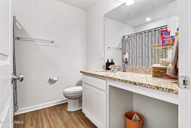 32 Chinquapin St, Beaufort, SC 29906 - bathroom with toilet, visible vents, baseboards, wood finished floors, and vanity