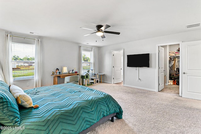 32 Chinquapin St, Beaufort, SC 29906 - carpeted bedroom with a walk in closet, baseboards, a ceiling fan, and visible vents