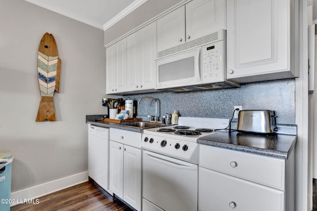 kitchen featuring white cabinetry, sink, dark hardwood / wood-style flooring, ornamental molding, and white appliances