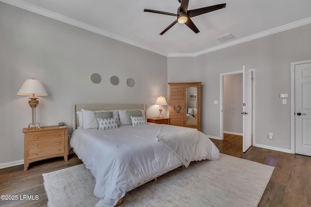 bedroom with ornamental molding, dark wood-type flooring, and ceiling fan