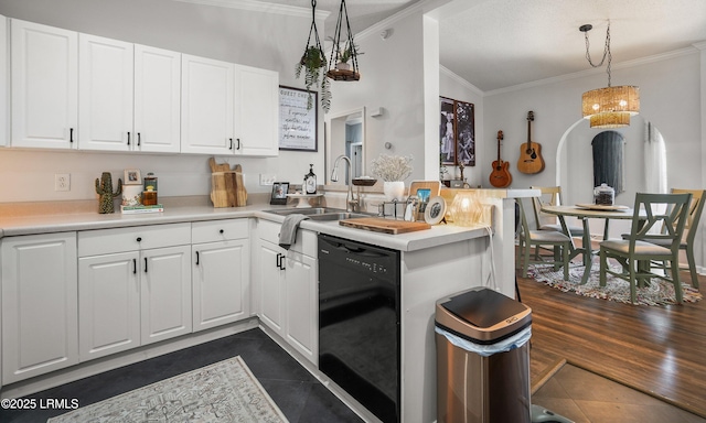 10 Rockville Way, Beaufort, SC 29902 - kitchen with black dishwasher, a peninsula, crown molding, white cabinetry, and lofted ceiling