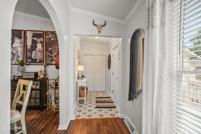 10 Rockville Way, Beaufort, SC 29902 - entrance foyer featuring wood finished floors, arched walkways, and crown molding