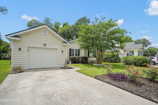 10 Rockville Way, Beaufort, SC 29902 - view of front facade featuring driveway, a front yard, and an attached garage