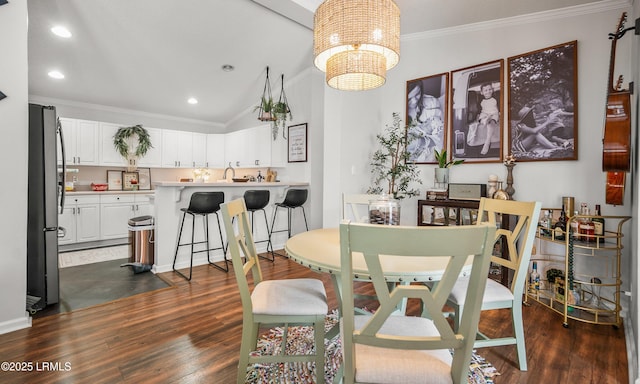 10 Rockville Way, Beaufort, SC 29902 - dining room with dark wood-style flooring, crown molding, a chandelier, vaulted ceiling, and recessed lighting