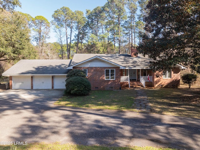 ranch-style house featuring a porch, brick siding, crawl space, a front lawn, and a chimney