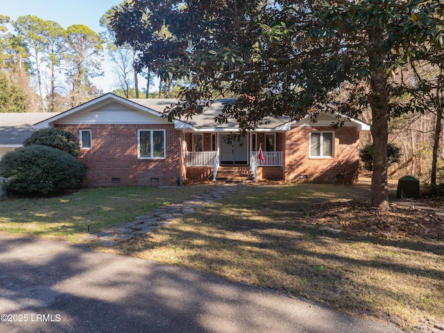 ranch-style home with crawl space, a front lawn, a porch, and brick siding