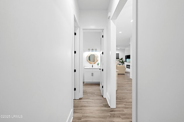 1014 Ferrets End, Beaufort, SC 29902 - hall featuring light wood-style floors, recessed lighting, and baseboards
