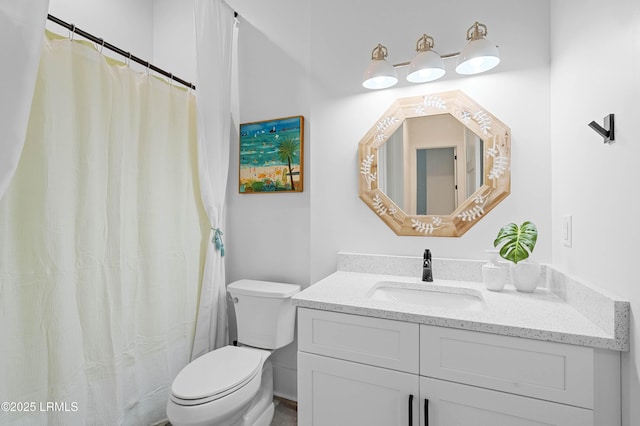 1014 Ferrets End, Beaufort, SC 29902 - bathroom featuring toilet, vanity, and curtained shower