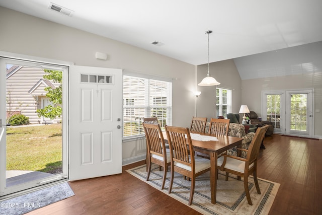 504 Candida Dr, Beaufort, SC 29906 - dining room featuring visible vents, baseboards, dark wood-style flooring, and lofted ceiling