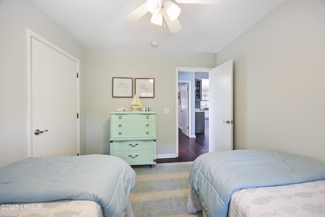 8 Bradley Beach Rd, Hilton Head Island, SC 29928 - bedroom with wood finished floors, a ceiling fan, and baseboards