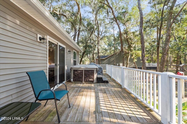 deck featuring a jacuzzi