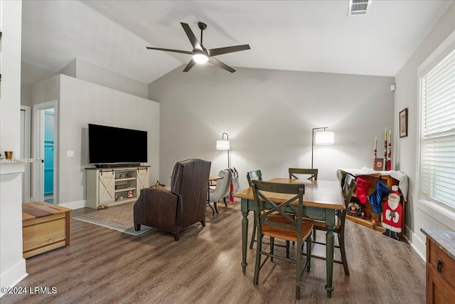 dining space with lofted ceiling, hardwood / wood-style floors, plenty of natural light, and ceiling fan