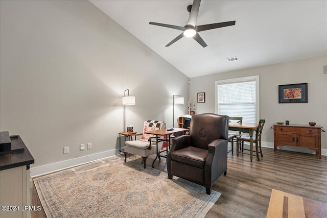 sitting room featuring lofted ceiling, dark hardwood / wood-style floors, and ceiling fan