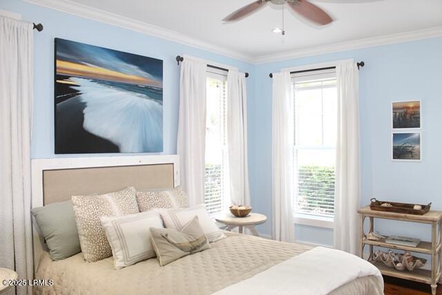 10 Hayek St, Beaufort, SC 29907 - bedroom featuring multiple windows, ornamental molding, and a ceiling fan