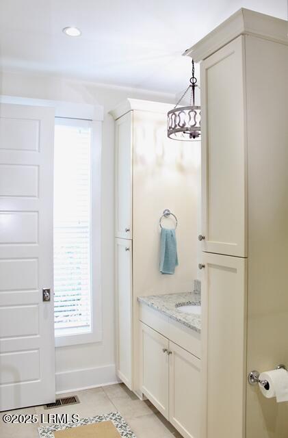 10 Hayek St, Beaufort, SC 29907 - bathroom with tile patterned floors, vanity, and recessed lighting