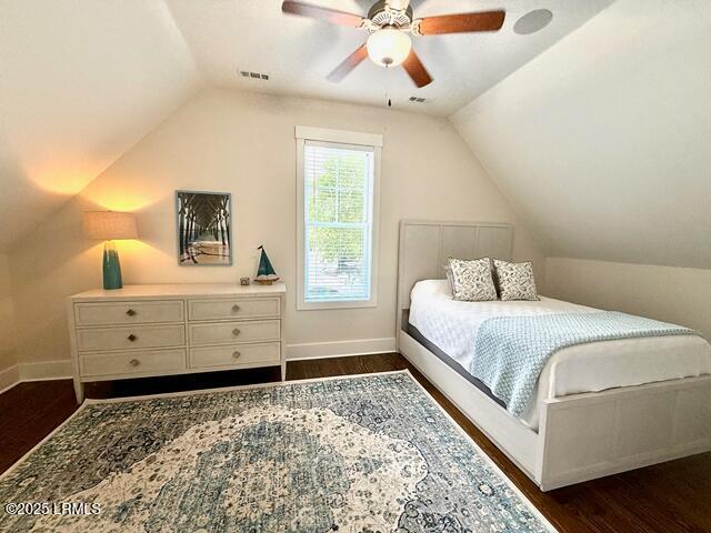 10 Hayek St, Beaufort, SC 29907 - bedroom featuring vaulted ceiling, dark wood-type flooring, and a ceiling fan