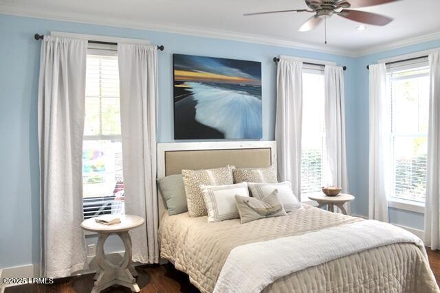 10 Hayek St, Beaufort, SC 29907 - bedroom featuring dark wood-style flooring, ornamental molding, and a ceiling fan