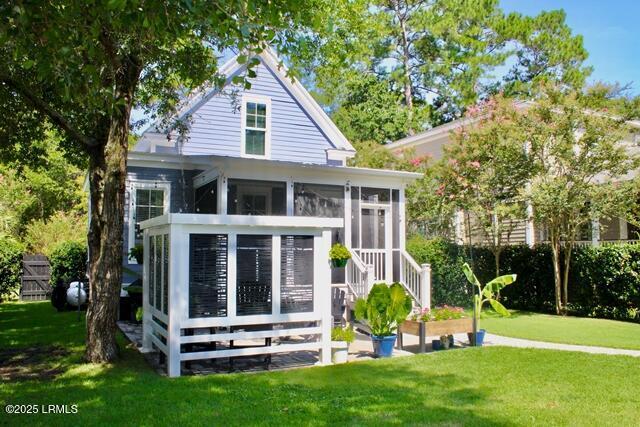 10 Hayek St, Beaufort, SC 29907 - view of outbuilding featuring a sunroom