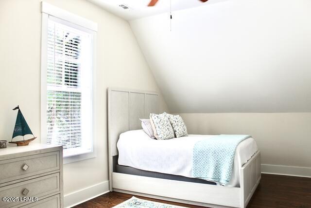 10 Hayek St, Beaufort, SC 29907 - bedroom featuring multiple windows, vaulted ceiling, dark wood finished floors, and ceiling fan