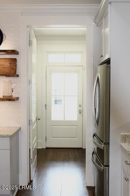 10 Hayek St, Beaufort, SC 29907 - doorway featuring crown molding and dark wood-style floors