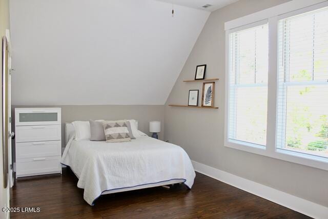 10 Hayek St, Beaufort, SC 29907 - bedroom featuring dark wood-style floors and vaulted ceiling