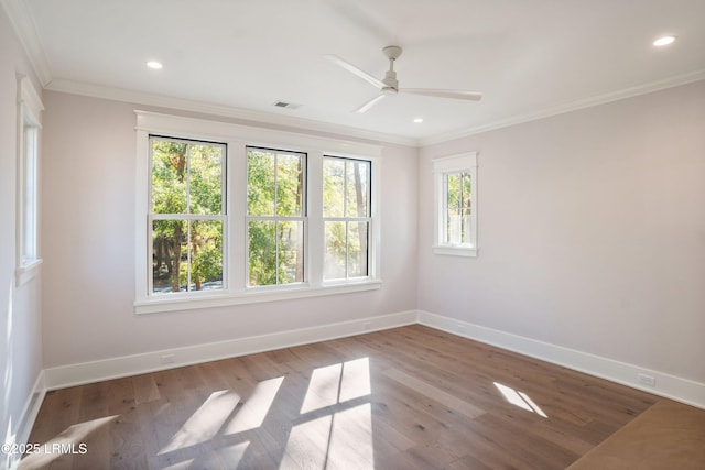 unfurnished room with crown molding, ceiling fan, and light wood-type flooring