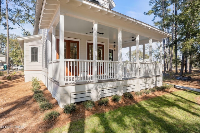 exterior space featuring ceiling fan and covered porch