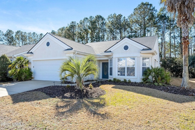 single story home featuring a garage and a front lawn