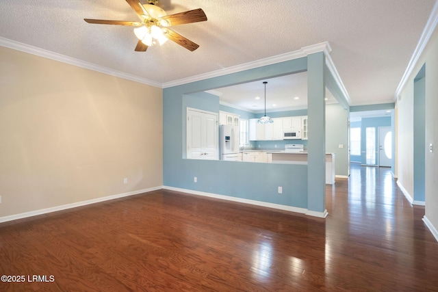 unfurnished living room with dark wood-type flooring, crown molding, and a textured ceiling