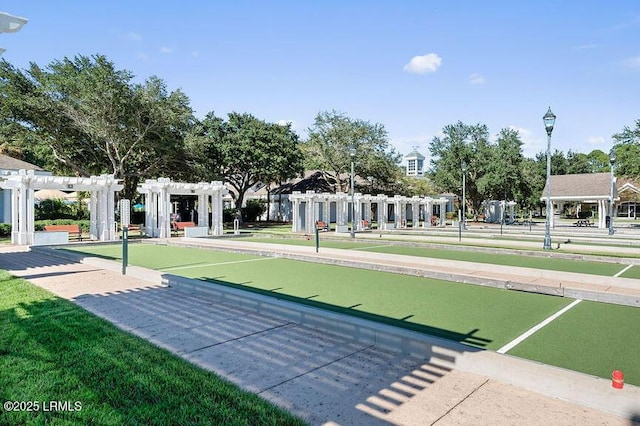 view of property's community with a pergola