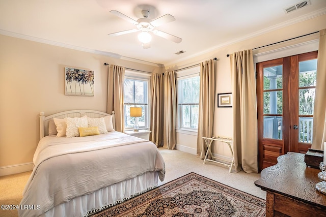 bedroom with ornamental molding, light colored carpet, access to exterior, and ceiling fan