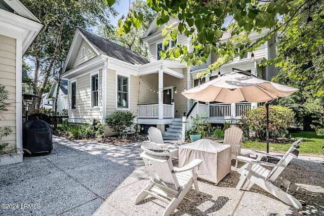 view of patio with a grill