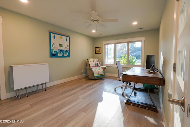 home office featuring ceiling fan, light wood finished floors, recessed lighting, and baseboards