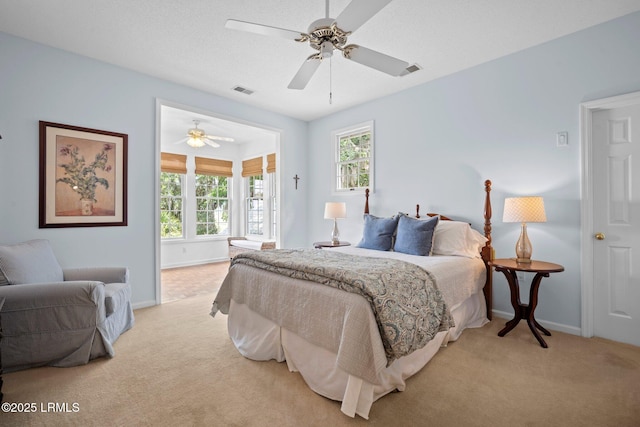 208 Cotton Dike Rd, Saint Helena Island, SC 29920 - bedroom with light carpet, multiple windows, and baseboards