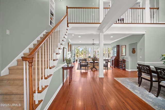208 Cotton Dike Rd, Saint Helena Island, SC 29920 - foyer featuring stairway, ceiling fan, wood finished floors, ornamental molding, and recessed lighting