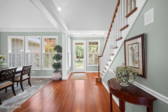208 Cotton Dike Rd, Saint Helena Island, SC 29920 - entrance foyer featuring stairway, ornamental molding, wood finished floors, baseboards, and recessed lighting