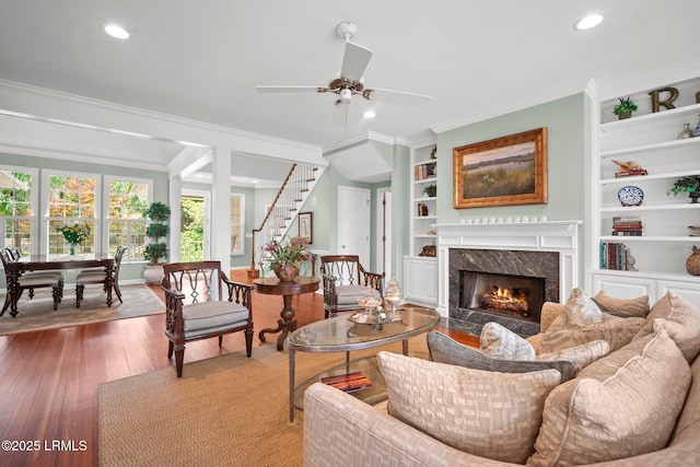 208 Cotton Dike Rd, Saint Helena Island, SC 29920 - living room featuring crown molding, a premium fireplace, recessed lighting, hardwood / wood-style floors, and a ceiling fan