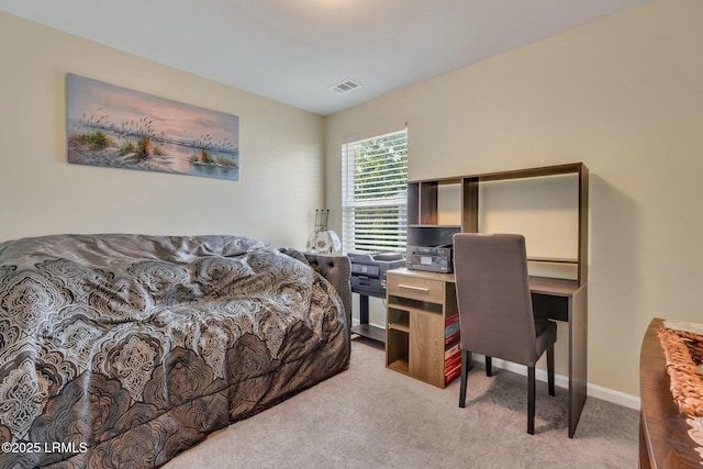 bedroom featuring light colored carpet