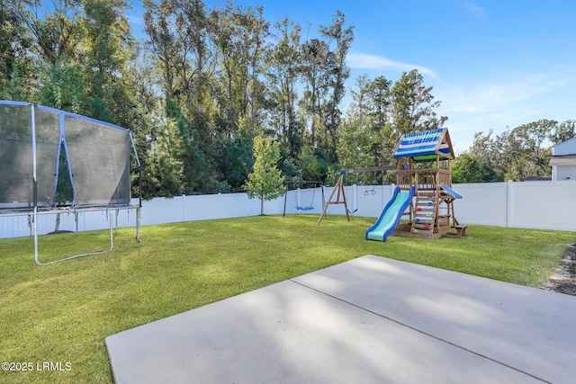 view of yard with a playground, a patio area, and a trampoline