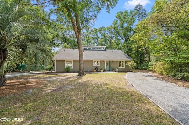 12 Harvest Ln, Beaufort, SC 29907 - view of front of property featuring covered porch, a shingled roof, and aphalt driveway